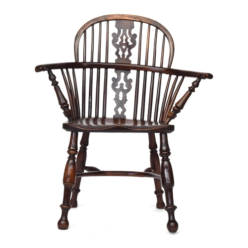 668 - A yew and elm Windsor chair pierced splat back, the yew arm bow set unusually wide on turned front s... 