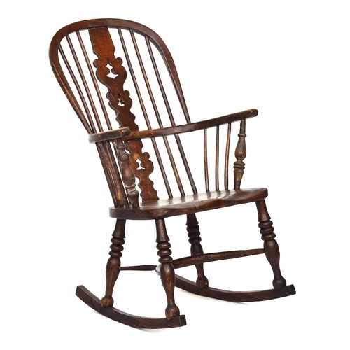 669 - A Windsor rocking chair, probably Lincolnshire, first half 19th century, with shaped pierced splat, ... 