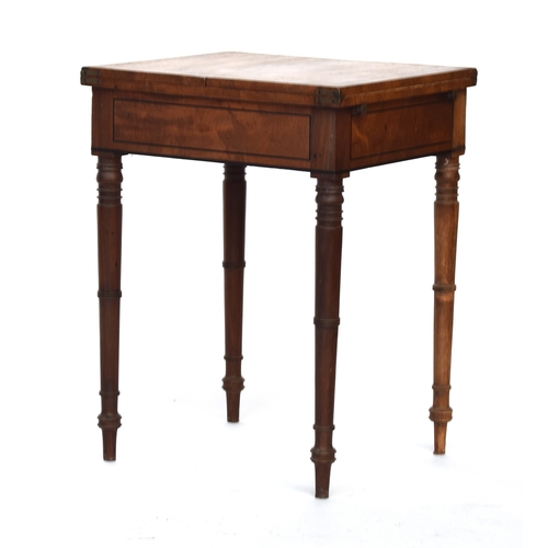 634 - A Regency mahogany and ebony strung occasional games table, c.1830, fold out top, on ring turned tap... 