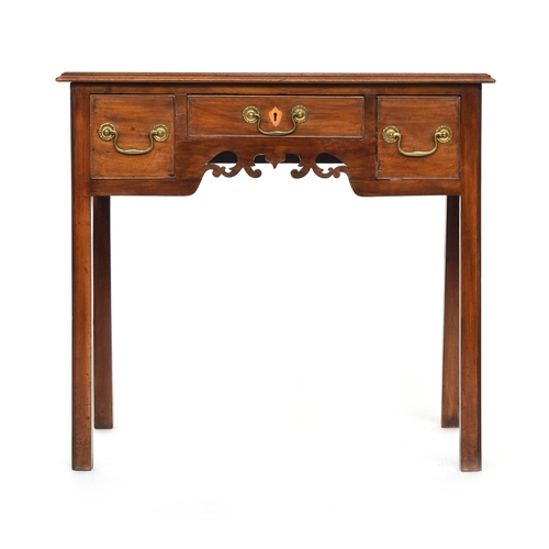 607 - A George III mahogany lowboy, moulded top over three frieze drawers, on moulded square section legs,... 