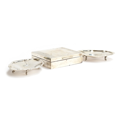 186 - A silver cigarette box by Mappin & Webb, London 1954; together with two silver pin dishes marked 'Be... 