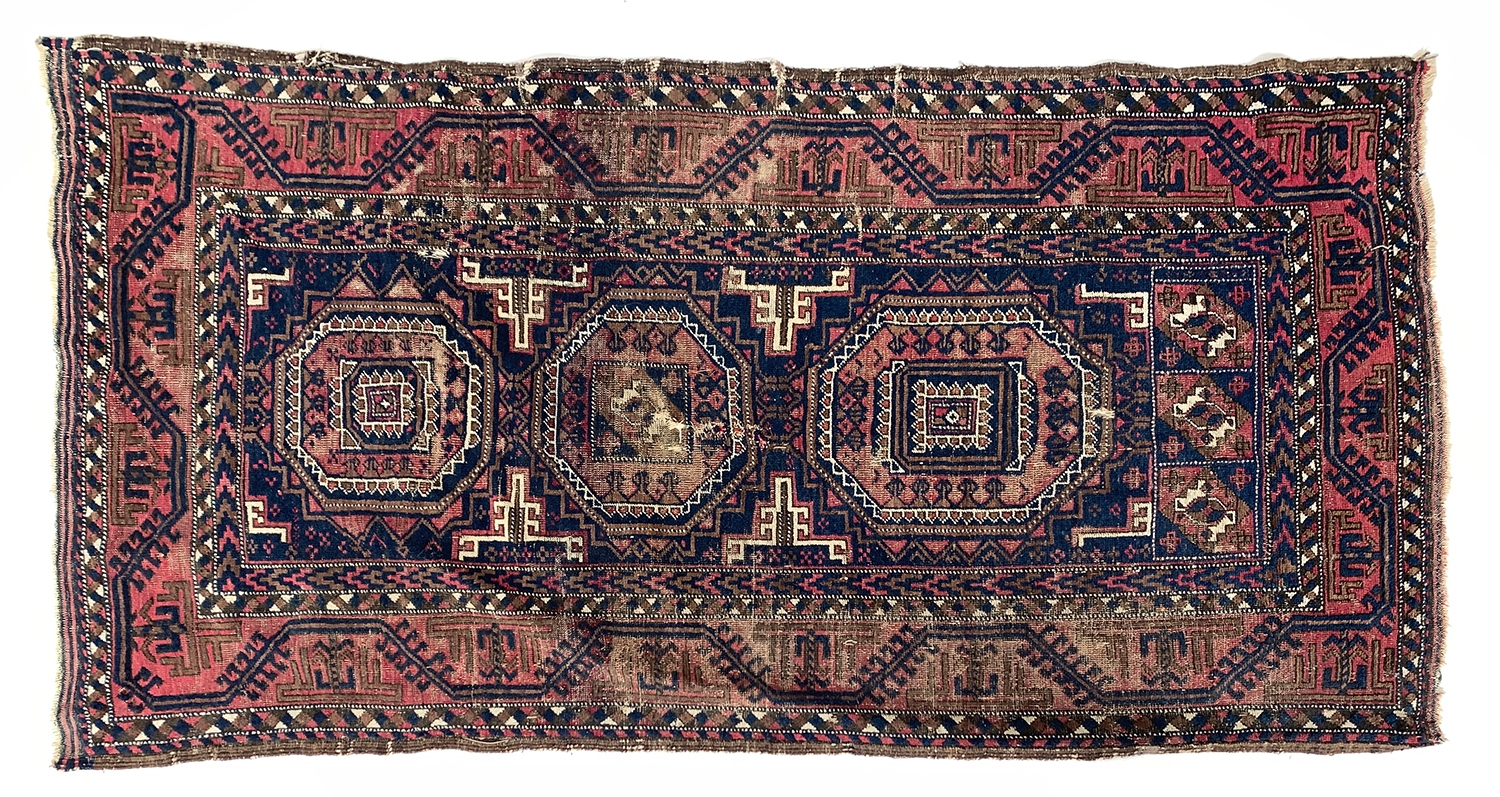 An asymmetric West Persian rug, 175x88cm; together with a very small ...