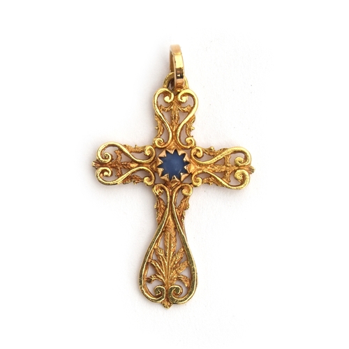 61 - An 18ct gold pierced crucifix set with a central blue stone, 3.2cm long, 3g