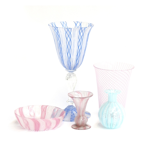 301 - A collection of Venetian reticello glass, to include a blue and white goblet, 20cm high; pink taperi... 