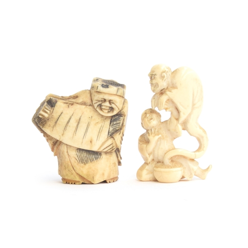 249 - A Japanese ivory okimono in the form of a man being haunted by a youkai, 5cm high; together with a b... 