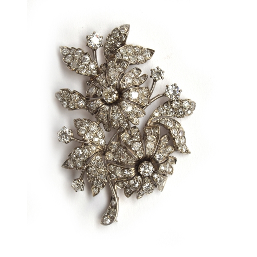 36 - A French Belle Epoque diamond and platinum brooch in a floral form, set with approx. 184 diamonds, t... 