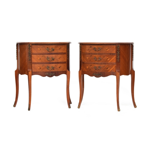 637 - A pair of French marquetry bedside cabinets with gilt metal mounts, each with three drawers over sha... 