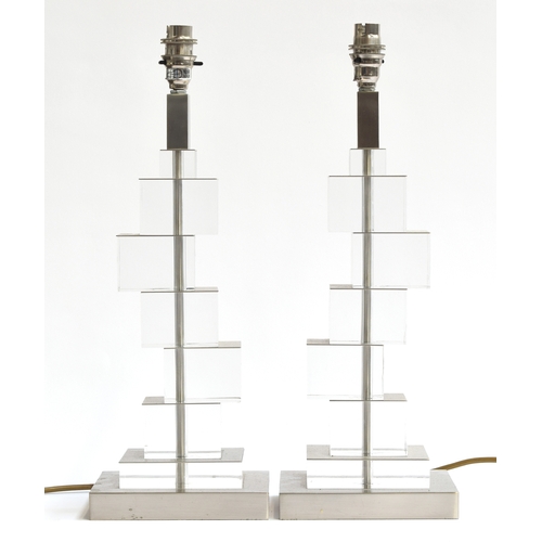 709 - A pair of lucite and brushed steel table lamps by Aminta, 45cm high