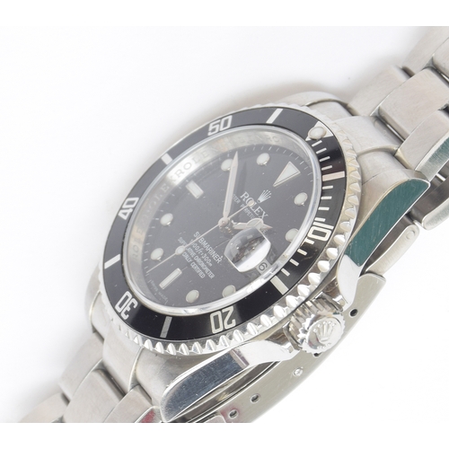 91 - A Rolex Oyster Perpetual Submariner gentleman's stainless steel bracelet wristwatch, ref. 16610, the... 