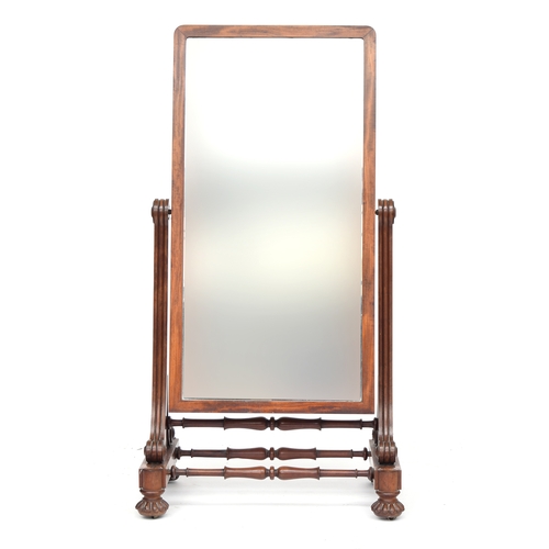 686 - An early Victorian mahogany cheval mirror, the supports joined by three turned stretchers, 84cm wide... 