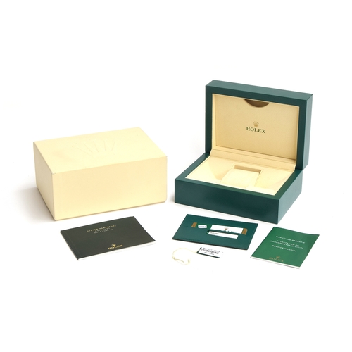 86 - A green Rolex box, with outer case, together with papers for a Datejust II