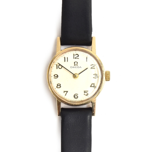 75 - A ladies Omega cocktail watch, Arabic numerals, 1.8cm diameter face, on black leather strap