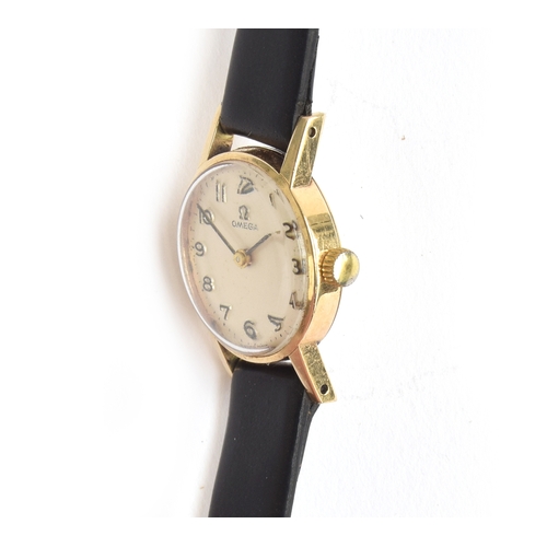 75 - A ladies Omega cocktail watch, Arabic numerals, 1.8cm diameter face, on black leather strap