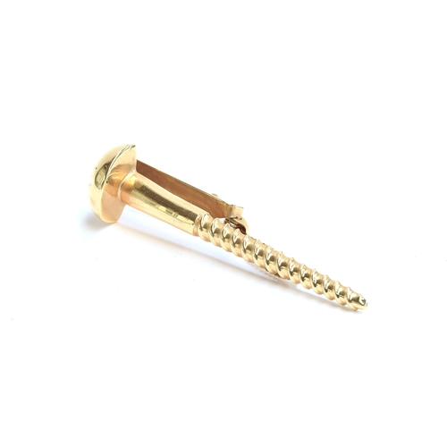 55 - A large 14ct gold tie clip in the form of an oversized screw, 8cm long, approx. 16.2g