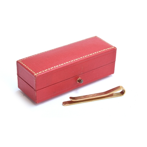 56 - A 9ct gold Cartier tie clip, 5cm long, approx. 5.3g, in a red Cartier velvet lined box