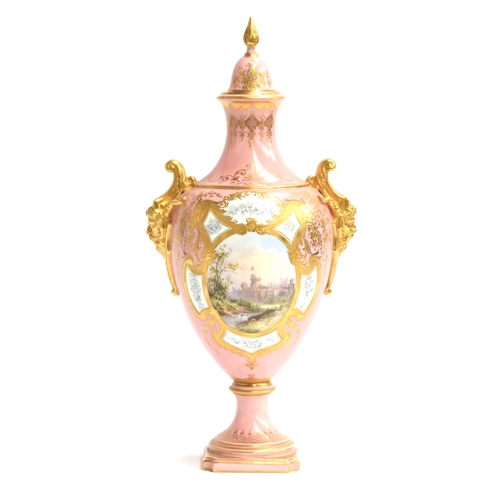 276 - An early 20th century Coalport lidded urn, pink ground heightened in gilt, with a hand painted panel... 