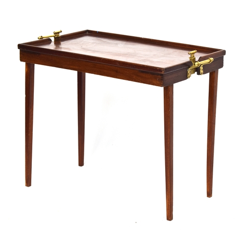 627 - A 19th century mahogany folding campaign butler's tray, with brass mechanisms, bears label 'The Oste... 