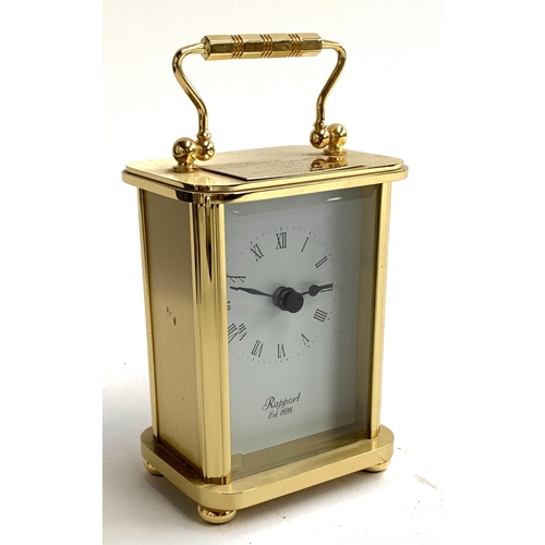 48 - A modern Rapport carriage clock with battery movement