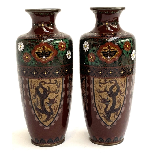 167 - A pair of Japanese Meiji era cloisonne vases, decorated with panels of birds and dragons, each 19cmH