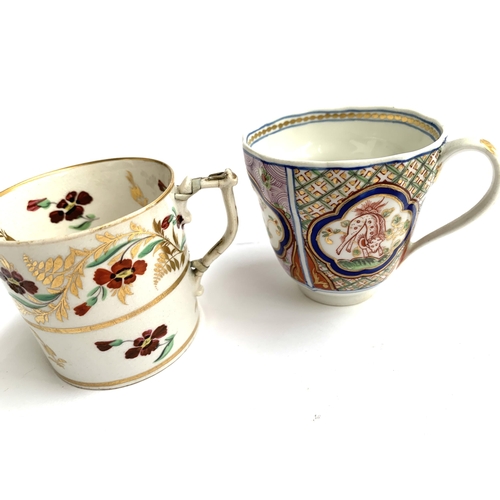 192 - Two 19th century Royal Crown Derby teacups, one with red flower pattern heightened in gilt (af), 6.5... 