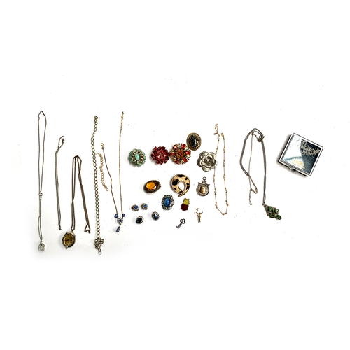 20 - A mixed lot of costume jewellery to include brooches, hallmarked blank silver medal, 6.6g; scarf cli... 