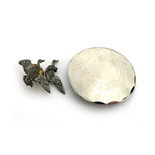 43 - A pewter brooch of ducks in flight by A R Brown, 3cm wide; together with a Lakeland Art Metal brooch... 