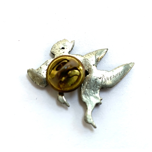 43 - A pewter brooch of ducks in flight by A R Brown, 3cm wide; together with a Lakeland Art Metal brooch... 