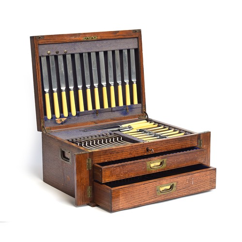 106A - An oak cased canteen of Hanoverian pattern plated flatware by Johnson Walker & Tolhurst Ltd, 21 Cond... 