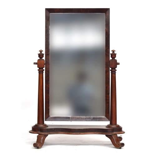 686A - A Victorian mahogany cheval mirror, on tapering turned supports, on a serpentine base, 147cm high, 1... 