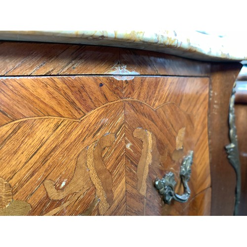 637A - A pair of French marquetry and parquetry bedside cabinets with gilt metal mounts, each with moulded ... 