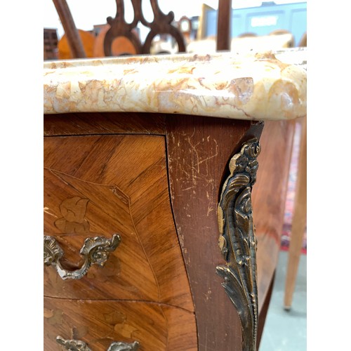 637A - A pair of French marquetry and parquetry bedside cabinets with gilt metal mounts, each with moulded ... 