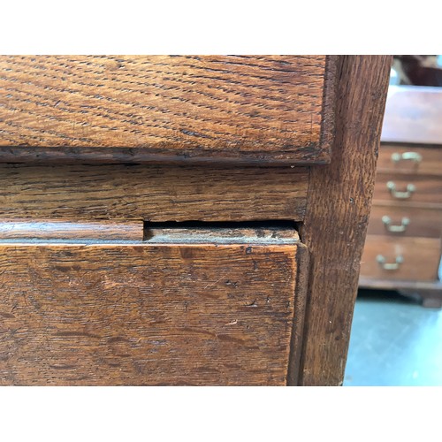 593 - A George II oak chest of drawers, the moulded top above two short and three graduating drawers with ... 