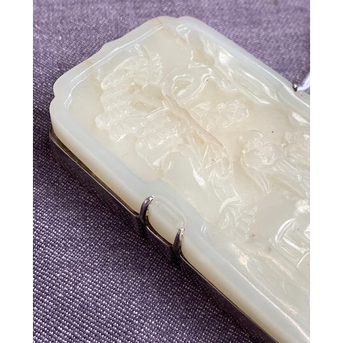 193 - A Chinese celadon jade mounted silver trinket box, the top carved with two figures and foliage, mark... 