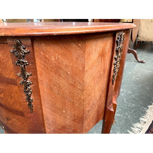 637 - A pair of French marquetry bedside cabinets with gilt metal mounts, each with three drawers over sha... 