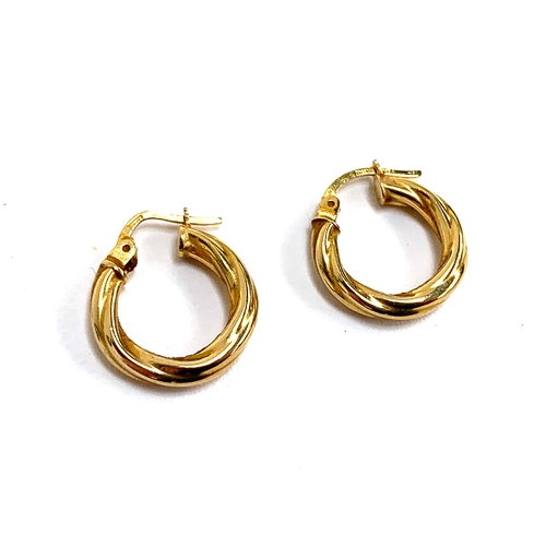 32 - A pair of 9ct gold hoop earrings, approx. 1.3g