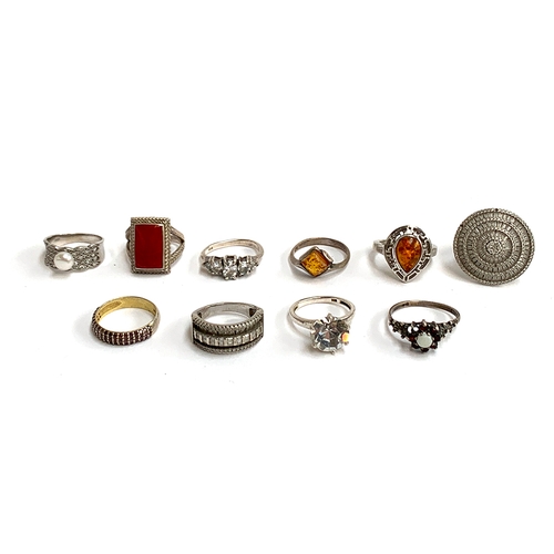 38 - A lot of ten silver rings, mainly 925 silver, one fully hallmarked English silver set with an opal a... 