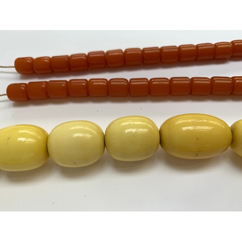 39 - A bakelite style bead necklace, approx. 139g, the largest bead 3cmL, 58cmL; together with an amber c... 