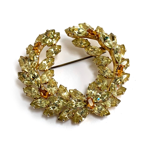 42 - A Christian Dior by Mitchel Maer citrine glass laurel brooch, marked to back, 6cmW