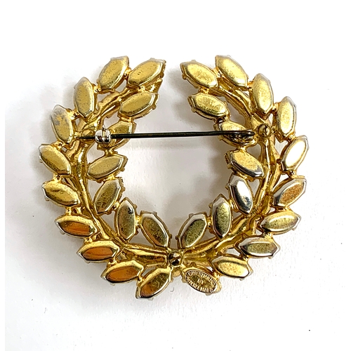 42 - A Christian Dior by Mitchel Maer citrine glass laurel brooch, marked to back, 6cmW