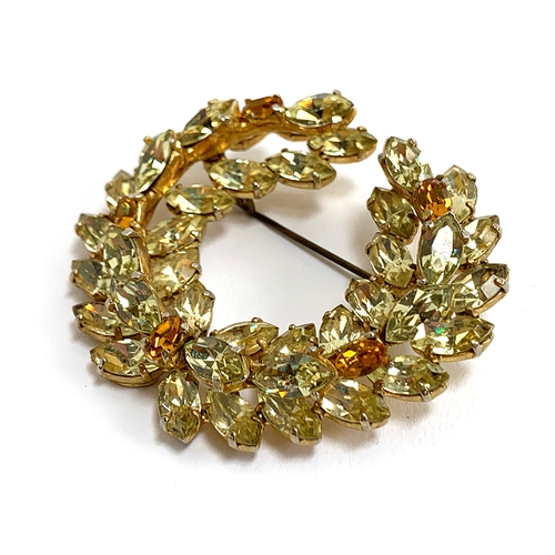 42 - A Christian Dior by Mitchel Maer citrine glass laurel brooch, marked to back, 6cmW