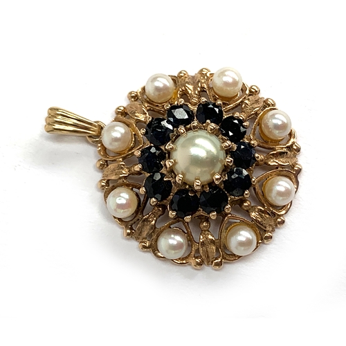 54 - A 9ct gold pendant set with pearls and sapphires, 2.5cmD, approx. 6.3g