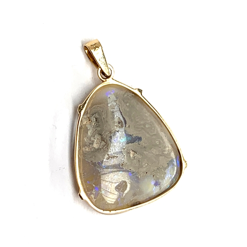 67 - A 14ct gold and opal slice pendant, 2.5cmL, 4.1g