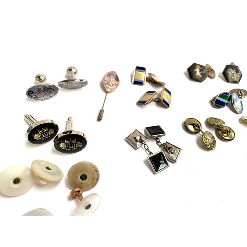 44 - A quantity of cufflinks include Duchamp, silver, Niello, enamel etc