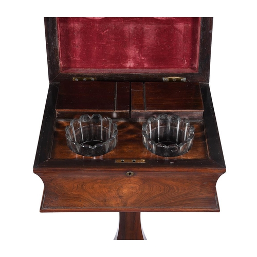 648 - A George IV rosewood teapoy circa 1830 with two internal lidded canisters and two glass mixing bowls... 