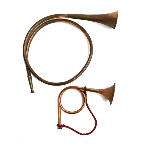 81 - Two French hunting horns, the larger approx, 32cmD