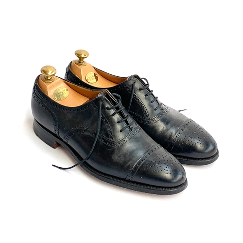 776 - A pair of Crockett & Jones black semi brogues, 'The Westminster', size 8E, with Crockett & Jones woo... 