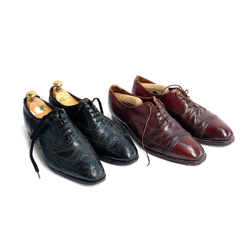 778 - A pair of Crockett & Jones black brogues, size 8E, with Crockett & Jones wooden trees; together with... 