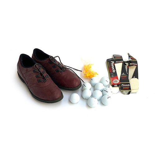 805 - A pair of Adidas golf shoes, size 8.5; together with a number of tees and balls