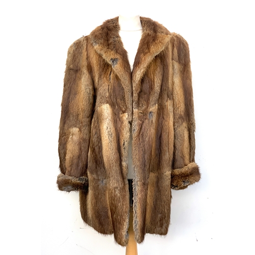 713 - A Brahams rabbit fur coat, with shawl collar