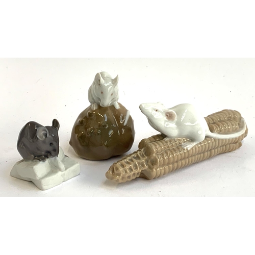 155 - Three Royal Copenhagen figurines, Mouse on Sugar no. 510, Mouse on Chestnut no. 511 and Mouse on Cor... 